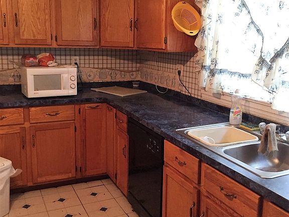 Kitchen has lots of cabinets