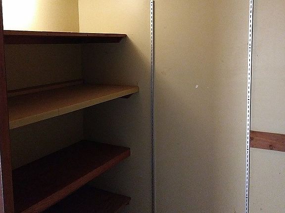 semi-walk in closet (master)