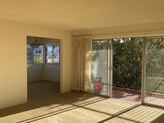 LIving room to balcony and dining room.