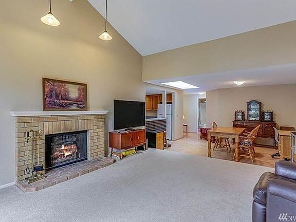 Refer to last 4 photos for photo of fireplace and flooring upgrades.
