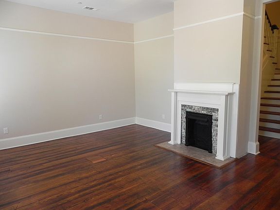 Living area looking out onto Broad Street (3 large full length picture windows)