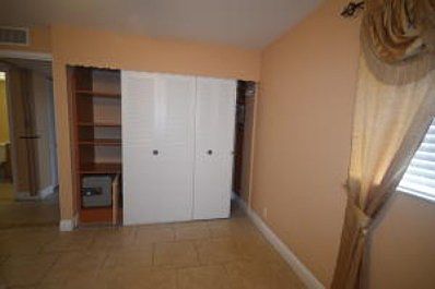 Bedroom with lots of closet