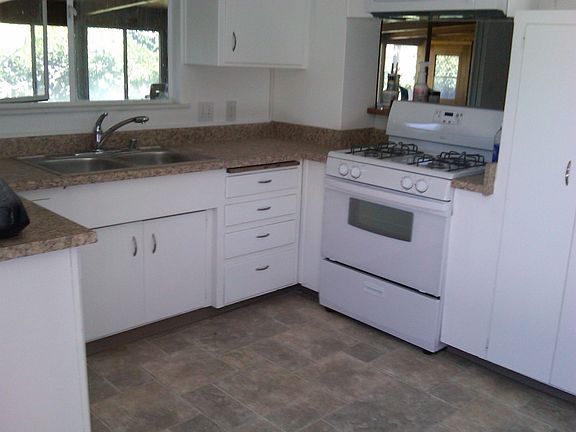 Kitchen with new range and microwave