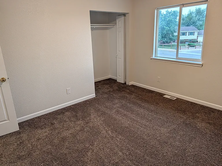 Master bedroom, showing smaller closet.