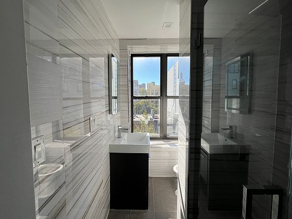 5th image of 411 E 118th St APT 27