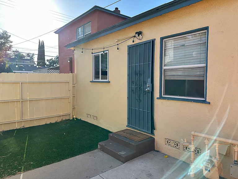 Fenced-in back patio