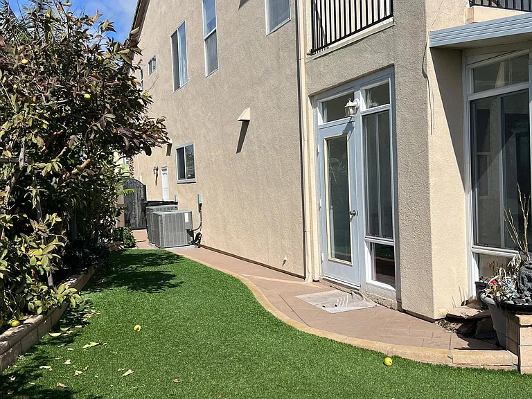 Backyard with artificial turf/grass