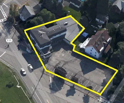 Building and private parking lot for tenants and guests only