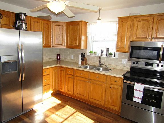 newer kitchen with stainless appliances