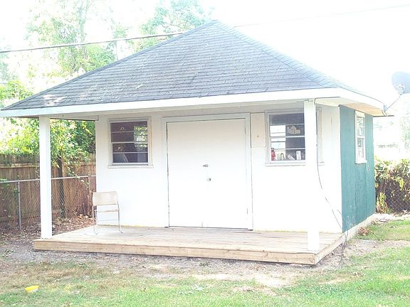 Workshop - 16' x 12.2' with electrity & it's own porch.