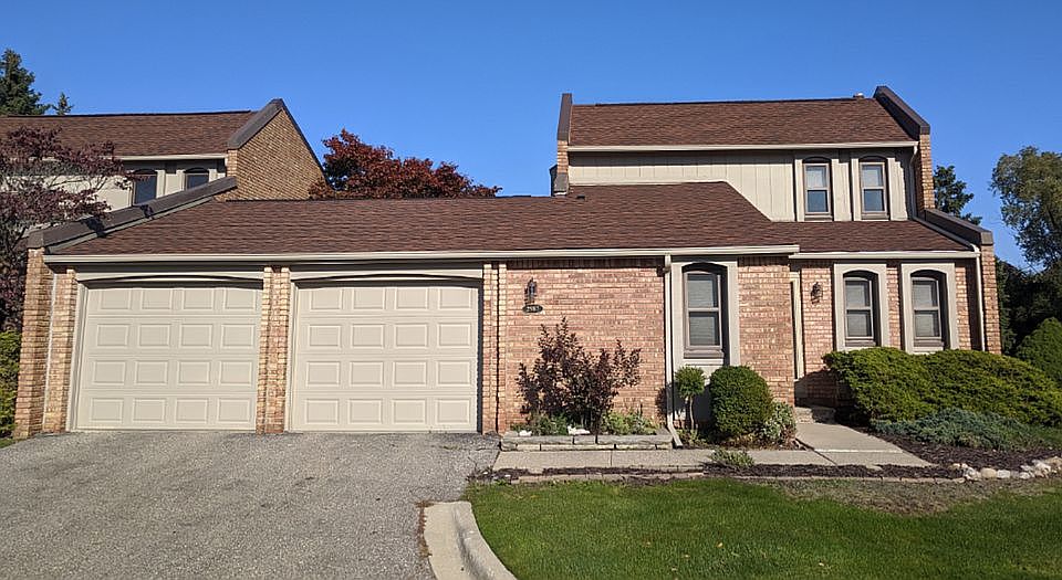 Front View with 2 car garage