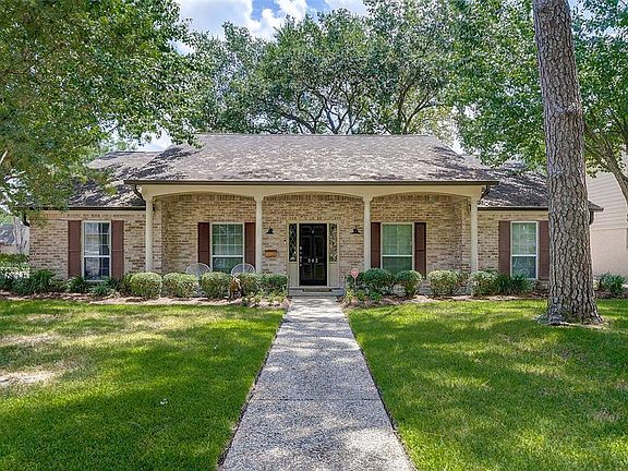 This home sits on a large corner lot with lots of green space and mature trees.