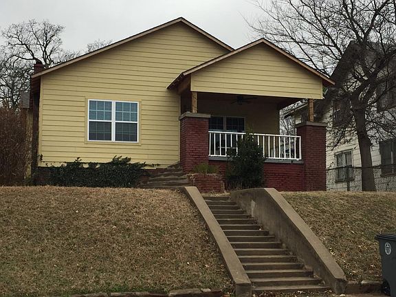 Front of house with large porch