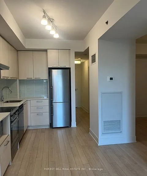 310 Tweedsmuir Ave #201 — Photo 13