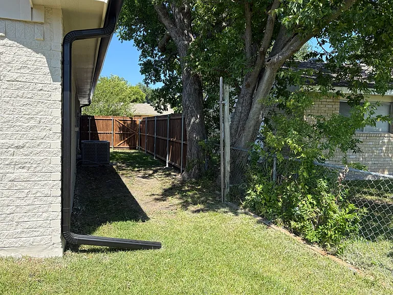Side yard, property fully fenced