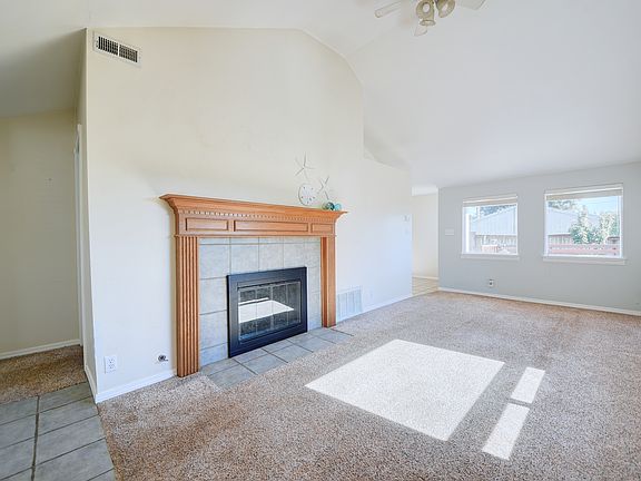 Living room (fireplace does not work but may be converted to gas)