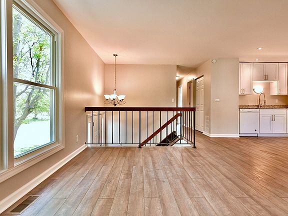 Open concept kitchen/dining/living room