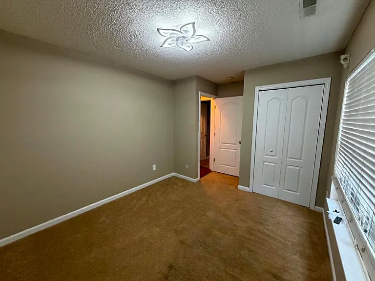 Bedroom 2, remote controlled ceiling fan, great for in-home office.