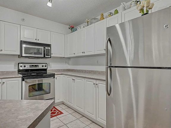 2nd image of 11220 W 104th Ave #404