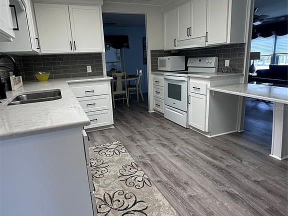 4th image of 1100 BELCHER ROAD S #523