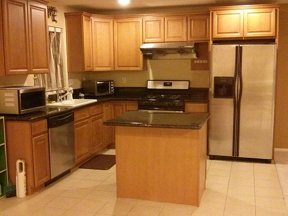 Kitchen with refrigerator