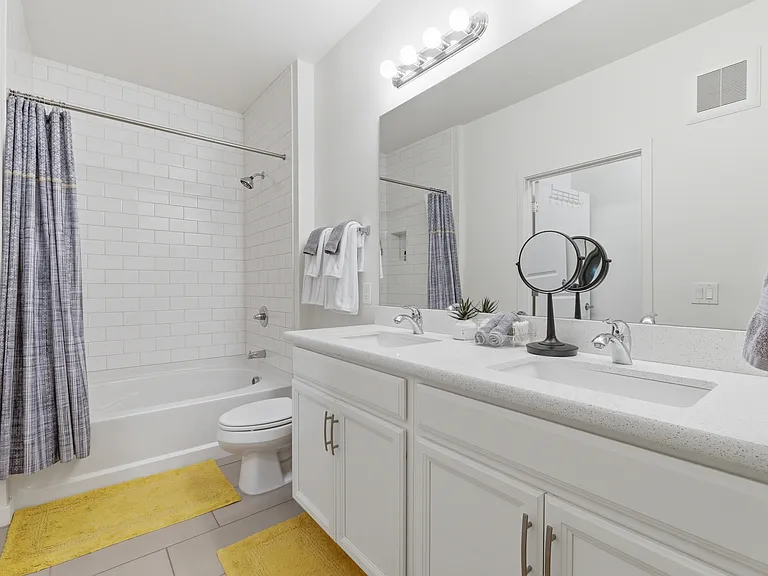Clean, modern full bathroom with quality finishes.
