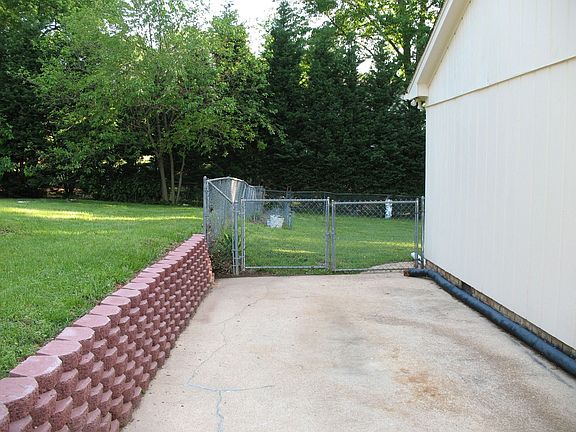 Front Left Side of House and Gate Entrance