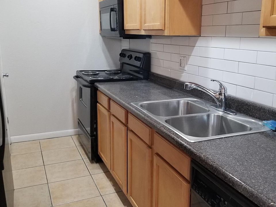 beautiful granite countertops and new white subway tile backsplash