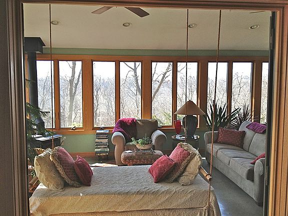 The hanging bed is the perfect place to curl up with a good book.
