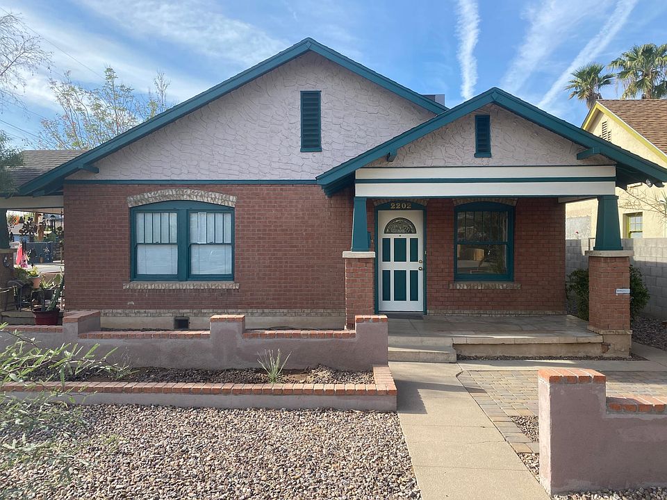 Front porch and low-maintenance landscaping.