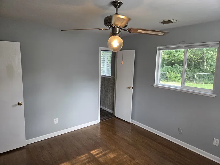 Master bed room looking towards half bath