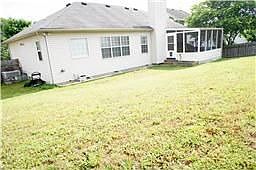 View of Back with Screen Porch FUll Privacy Fenced yard