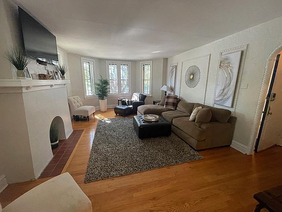 Living Room Looking Towards Bright Windows Facing S. Hanley
