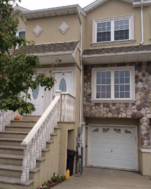 Front of the building. Door entrance on the side.