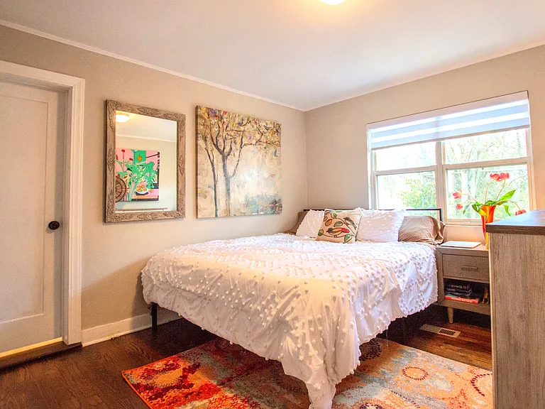 Master bedroom, king size comfy hybrid bed with 50" smart tv and en suite full bathroom