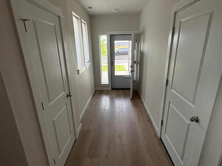 Closet on left, garage door on right