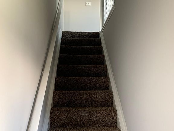 Upstairs unit with your own stair case inside! Great for shoe rack at the bottom!