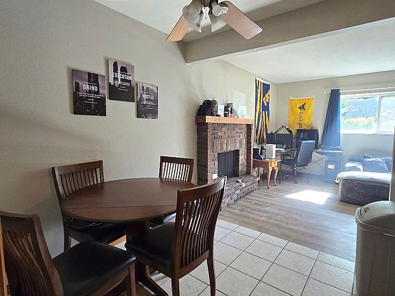 Dining area with living room in background