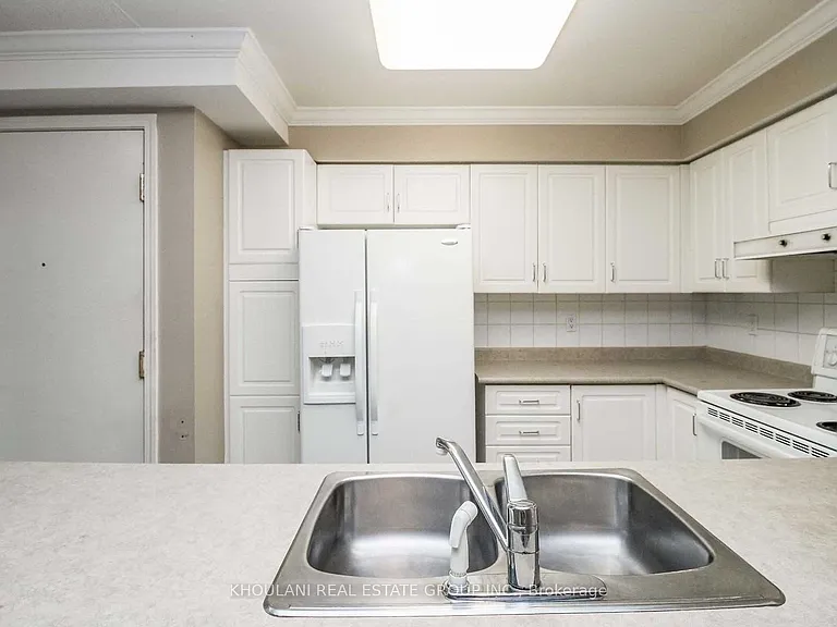 35 Kingsbridge Garden Cir #312 — Photo 16
