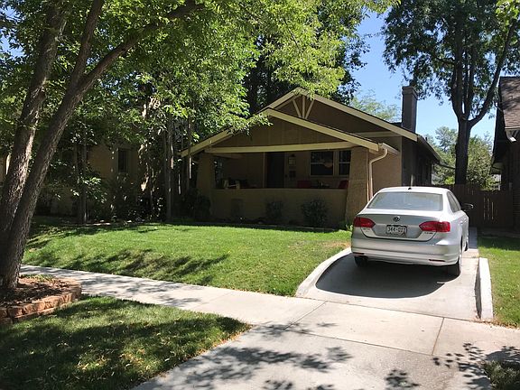Front of house with driveway (fits 2 cars); ample street parking