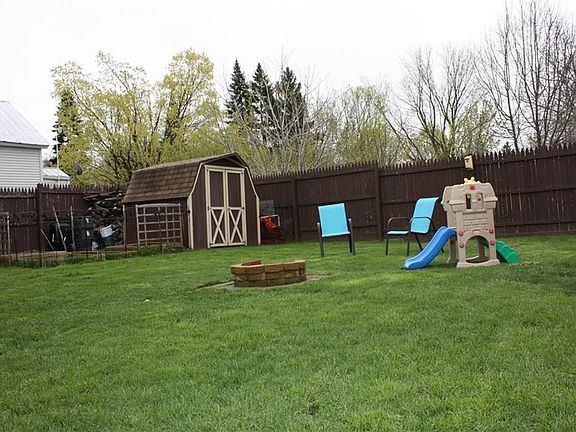 Large Backyard with Shed and garden area