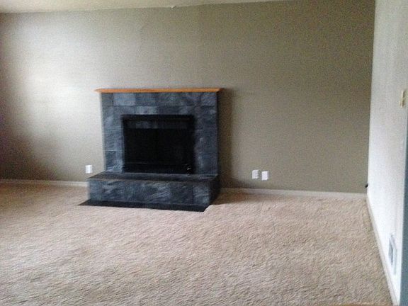 Living room with wood fireplace