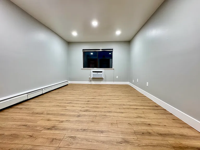 The 1st Bedroom includes brand new flooring and new ceiling lights.