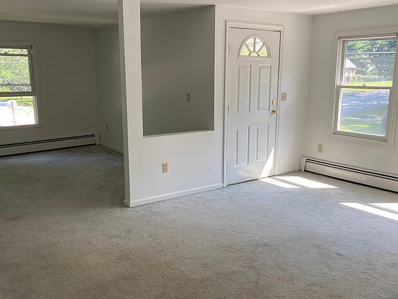 Living Room and Open concept room that could be used as Bedroom, Office