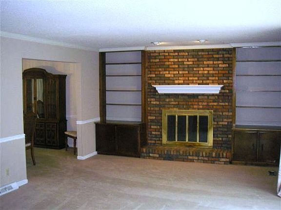 Den with gas-log fireplace