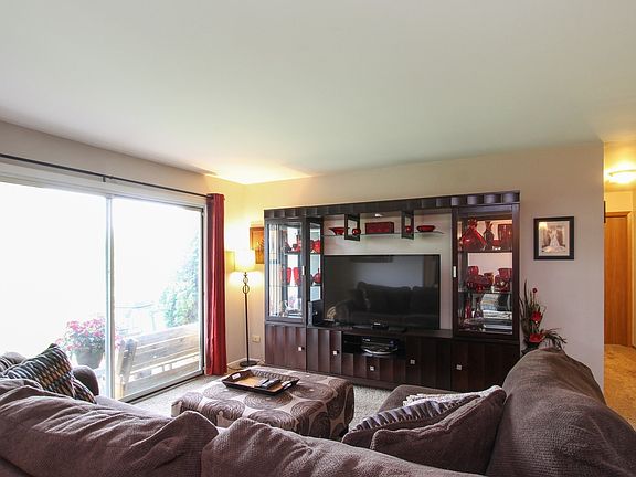 Spacious Living Room with large patio doors overlooking nature!