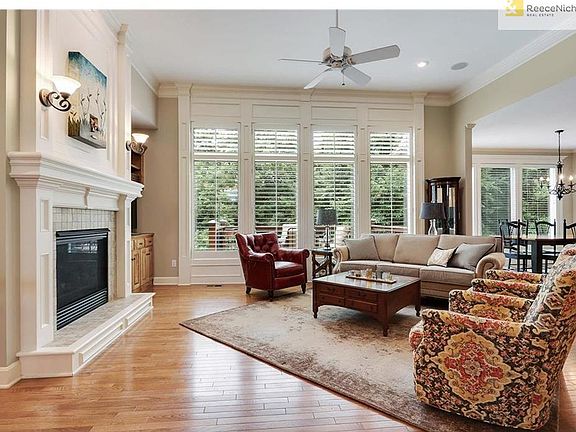 The family room is open with lots of windows to view your private treed lot.