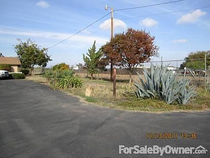 Looking west from front of property
						:
						This is at end of private cul-de-sac road.