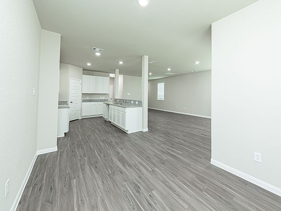 Dining Area to Kitchen and Family Room