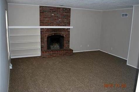 3rd image of 9815 Woodland Ln